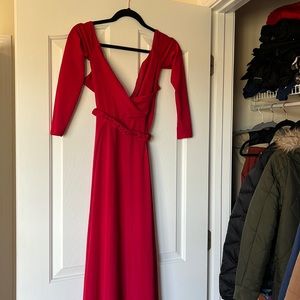 Alamour the label dress. Has been altered to 5’4 height probably
